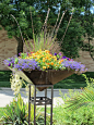 Stand out with an upside down pyramid pot, full of color! www.earlmay.com