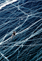 Riding a horse across a frozen lake