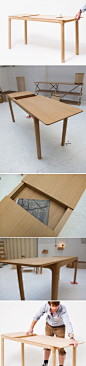 Mathias Hahns设计的M11书桌，储物空间隐藏在可以滑动的面板之下。