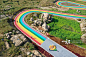 山东枣庄山亭区岩马湖畔彩绘后的乡村盘山公路如同彩虹降落人间图片素材