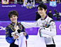 Yuzuru Hanyu of Japan celebrates after defending his Olympic title in the men's figure skating at the Pyeongchang Winter Olympics in Gangneung South...