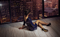 People 1680x1050 women model brunette long hair book cover sitting on the floor wooden surface blue dress high heels stiletto black heels cityscape night lights skyscraper building window