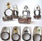 Resin, metal rings, mini-figures.