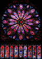 玫瑰窗（the rose window） 也称玫瑰花窗，为哥特式建筑的特色之一，指中世纪教堂正门上方的大圆形窗，内呈放射状，镶嵌着美丽的彩绘玻璃，因为玫瑰花形而得名。