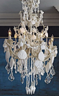 An ethereal symphony of cascading crystals and seashells, our Harbor Shell Chandelier casts a captivating note in any space.