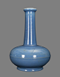 A CLEAR-DE-LUNE GLAZED VASE. The vase is single-gourd shaped and the exterior is overall a ligth blue color tone. There is a marked seal on the base of the vase. 13 1/4 in. H. Qing Dynasty