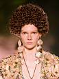 Gucci Cruise 2019 runway show model wearing bouffant