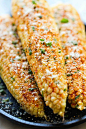 Mexican Corn on the Cob  by damndelicious: This is the best way to serve corn, brushed with melted butter and sprinkled with chili powder, cheese and lime! #Corn #Mexican