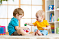 two-children-boys-play-together-educational-toys-in-playroom.jpg (5314×3543)