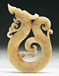 A Chinese Archaic Jade Pendant: finely carved as an dragon in flight, the jade of yellowish grey color, of Warring Period Dimensions: H: 4-3/4": 