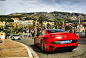  Ferrari California and Lamborghini parked in front of Hotel the Paris 