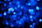 明亮,闪亮的,电灯,色彩饱和,纹理效果_157527514_defocused blue light dots against black background_创意图片_Getty Images China