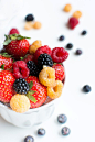 Colorful healthy fresh berries in a cup
