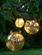 LED Fairy Dust Balls. Add a magical touch to porch or landscape. Battery-powered, so you can hang them in the shade. Built-in timer; set it once and it turns on at the same time each day. Large is 6 inches in diameter; medium is 5 inches in diameter.: 