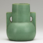 Teco Vase, ca. 1910. Many Teco pottery shapes were inspired by Chicago architecture in the early 20th century. The geometric form of this vase resembles shapes found in architectural design.