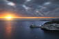 General 2048x1356 photography nature clouds sunset Sun lighthouse rocks mountains sea far view optical flares