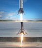 A simulated rocket landing in 2011, top, and the real thing earlier this year.