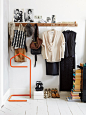 wardrobe display and orange coat hanger