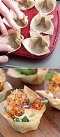 Chili Lime Shrimp Cups - These mini cups are perfect to serve at a party and are great warm or cold. You can make the wonton shells a day in advance; just keep at room temperature in an airtight container. From inspiredtaste.net | @inspiredtaste #shrimp #