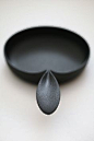 Cast iron pan with pinched handle