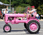 Suzanne on Her Pink 1941 Farmall B Tractor