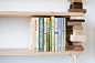 Bookshelf Built Simply from Waste Wood Blocks and Rope