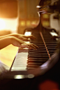 Close up of Caucasian girl playing piano - stock photo
