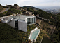 X House by Cadaval & Solà-Morales : X House is an X-shaped house by Cadaval & Sola-Morales hanging over the edge of a hillside near Barcelona.