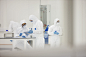 Scientists working in laboratory by Image Source on 500px