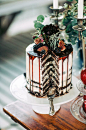 layered chocolate cake - photo by Petra Veikkola Photography http://ruffledblog.com/finnish-mansion-wedding-inspiration: 