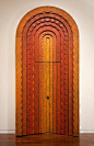 stunning. beautiful carved door.