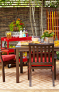 Organize your outdoor furnishings to create intimate retreats beside dining areas for company. --Lowe’s Creative Ideas