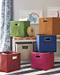 Pandan Bins : Tailored storage with a tropical twist, these textural bins are made of sturdy, handwoven palm fronds with a stitched contrast trim.