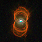 This snapshot of the Hourglass Nebula, also known as MyCn18, reveals that the object has an intricate pattern of "etchings" in its walls. The hourglass shape may be produced by the expansion of a fast stellar wind within a slowly expanding cloud