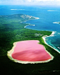 Lake Hillier, Australia. The only naturally pink lake in the world. And it's completely safe to swim in.