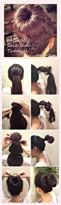 Place the donut about 1/2 way down the length of your ponytail and get ready to rock and roll.    Wrap the