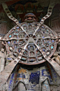 Six Realm Wheel of Rebirth - Baodingshan Buddhist Rock Carvings, Dazu. Picture by Steve Byrne: 