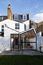 A Renovation Reviving London’s ‘Butterfly Roof