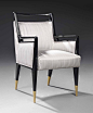 GIO PONTI (1891-1979) ARMCHAIR, CIRCA 1950 produced by Cassina, lacquered ebonised wood, brass sabots and upholstery 35 in. (89 cm.) high; 22 7/8 in. (58.2 cm.) wide; 21¼ in. (54 cm.) deep