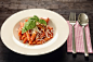 Plate of penne pasta with arrabiata sauce by Lars Zahner on 500px