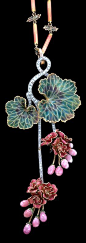 Circa 1900 An Art Nouveau 18 karat gold, diamond, conch pearl and plique-à-jour enamel ‘Morning Glory’ necklace, attributed to Marcus & Co., circa 1900. The pendant set with round diamond accents culminating in plique-à-jour flower clusters with 11 co