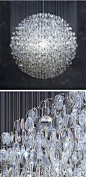 "Optical chandelier" by Stuart Haygarth (made with old lenses)
