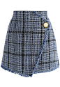 Winsome Asymmetry Grid Tweed Flap Skirt in Navy : You winsome, you win it all! Tweed is all you need this fall when you’re going the mini-skirt route. Its asymmetrical cute, soft-fringed detail and large but simplistic button make it a fun way to play wit