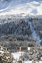 Exterior, Prefab Building Type, Flat RoofLine, Metal Siding Material, and Wood Siding Material The modern ski chalet in its snowy alpine setting.  Photo 10 of 13 in This Hotel in the Swiss Alps Is Made Up of 96 Prefab Modules