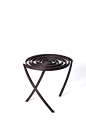 旋转漩涡椅by XYZ Integrated Architecture——
这把独特的椅子由钢条盘绕而成，三条弯曲的椅腿依照整体的动态趋势设置，配上富有质感的深褐色，显得稳重而优雅。椅子旋转时，仿佛形成了一个无尽的漩涡，吸引着人们的注意。 ​​​​