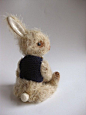 Rabbit by Domna Floralis  (not sure if he's needle felted or sewn, but he sure is appealing.)