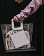 clear plastic tote bag with white leather handle. / sfgrlbybay