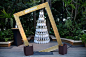 A photo op let guests pose with a tower of champagne bottles and a tilted frame with the hashtag #MoetMoment.  Photo: Michael Kovac/Getty Images for Moet & Chandon
