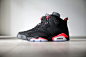A Closer Look at the Air Jordan 6 Retro Black/Infrared 23 : This Black Friday features the return of the coveted Air Jordan 6 Infrared. The 2014 Air Jordan 6 Retro "Black/Infrared 23" sports a smooth, solid black nubuck upper, which is then fini