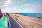 Green Car Near Seashore With Blue Ocean